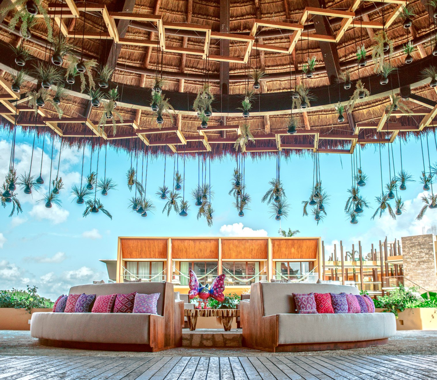 Hotel Xcaret México · Área de descanso bajo palapa